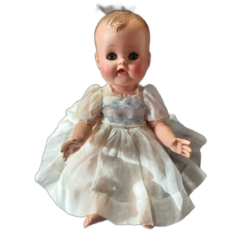 Vintage Madame Alexander drink & wet doll